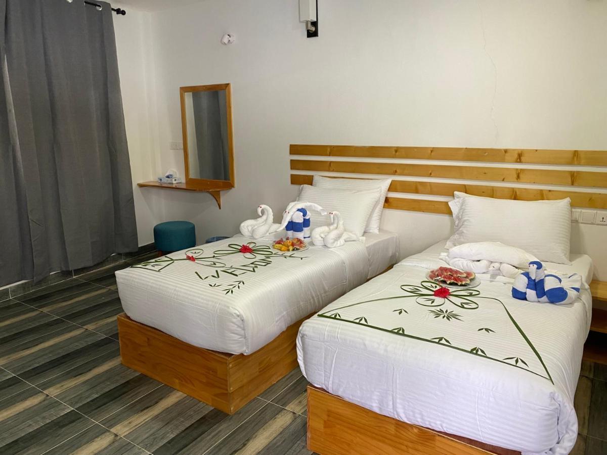 Ramzu Villa Thoddoo Buitenkant foto