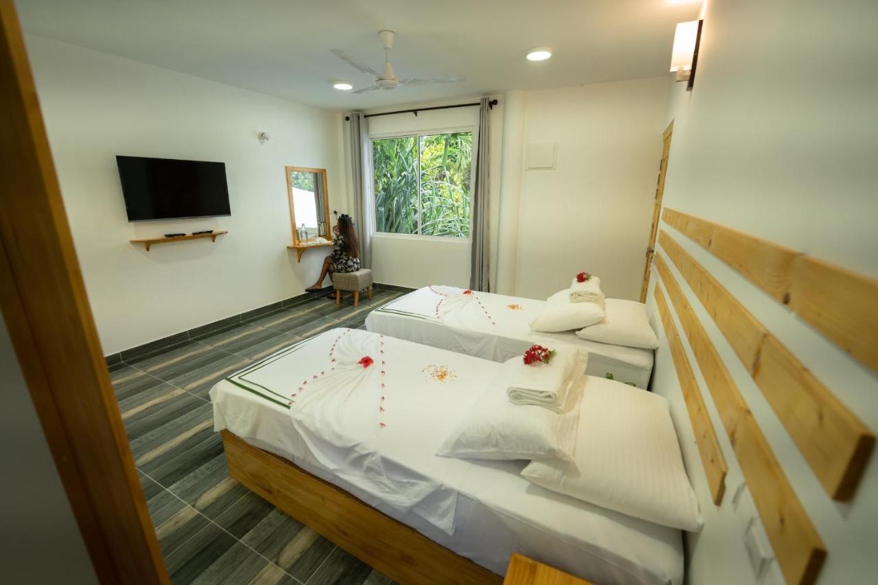 Ramzu Villa Thoddoo Buitenkant foto